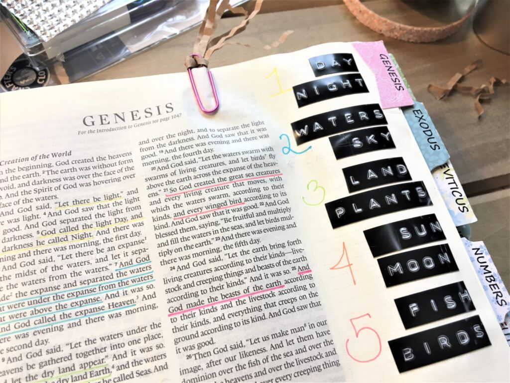 esv creative journaling bible laying open on table with embellishments