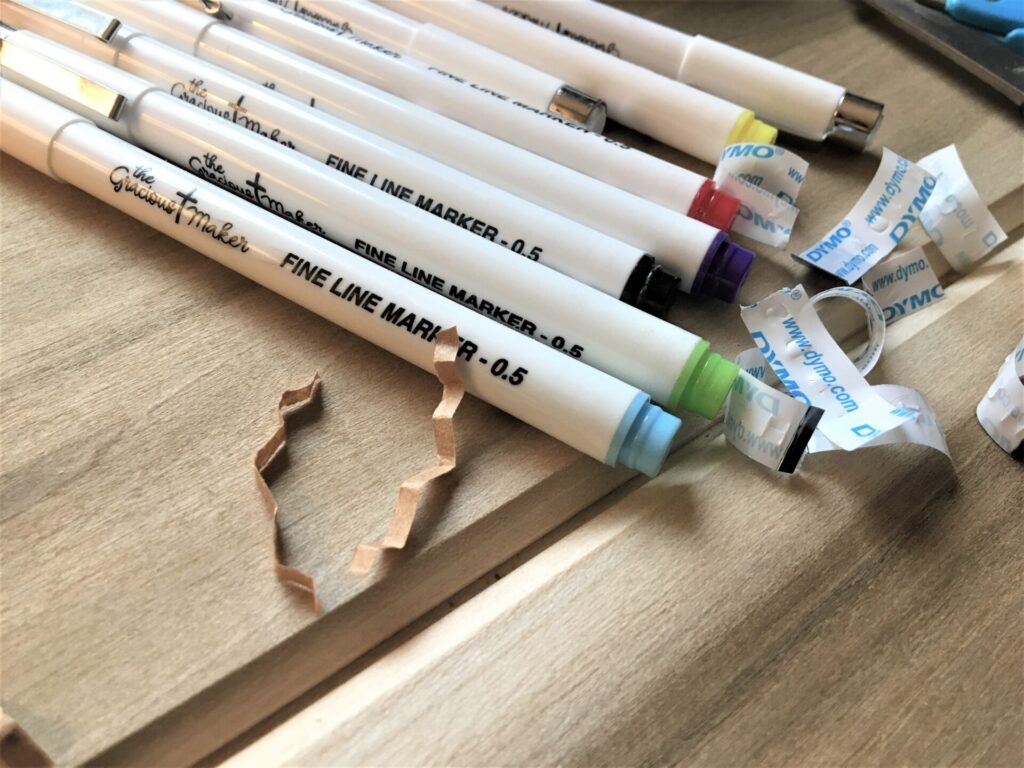 Markers laying on table for Bible journaling